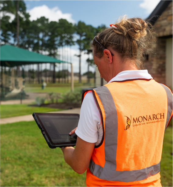 Woman looking at her iPad while on site at a corporate client